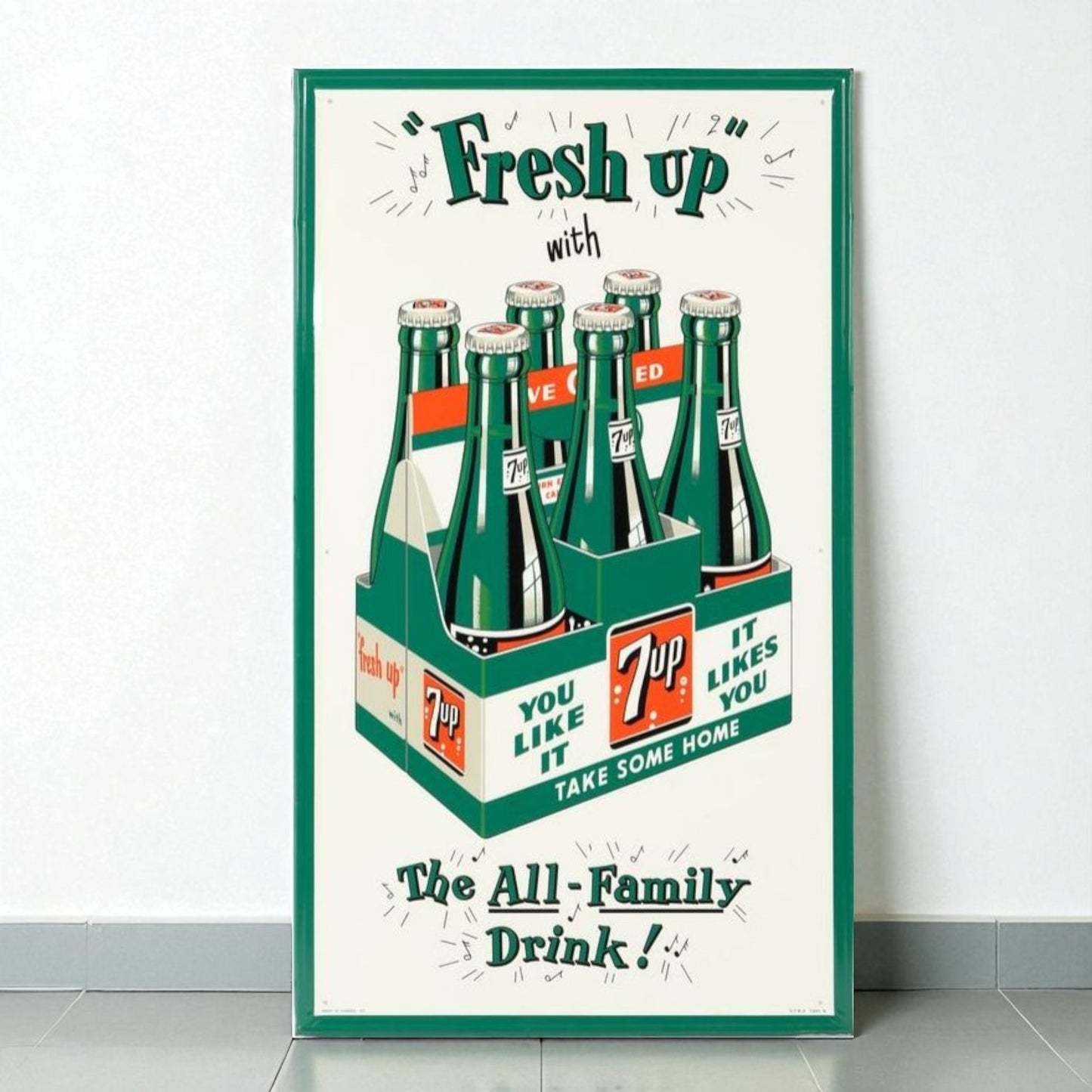 Vintage-style poster advertising 7-Up soda with a green frame.