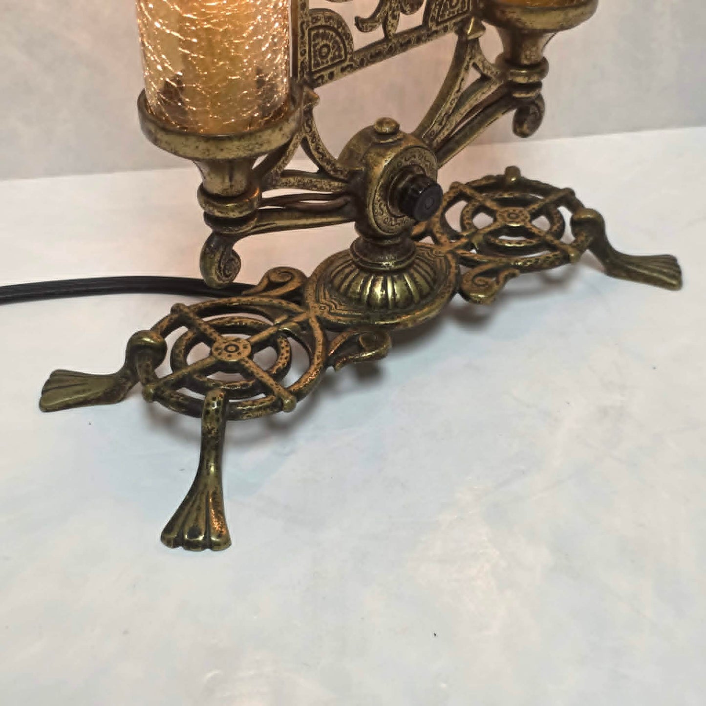 Exceptional Art Deco Mutual Sunset bronze lamp with Pan figure, original patina, and amber glass shades.
