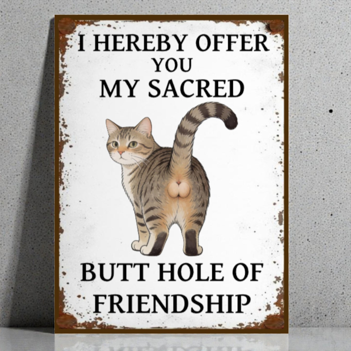 Sign with a cat illustration and humorous text on a white background