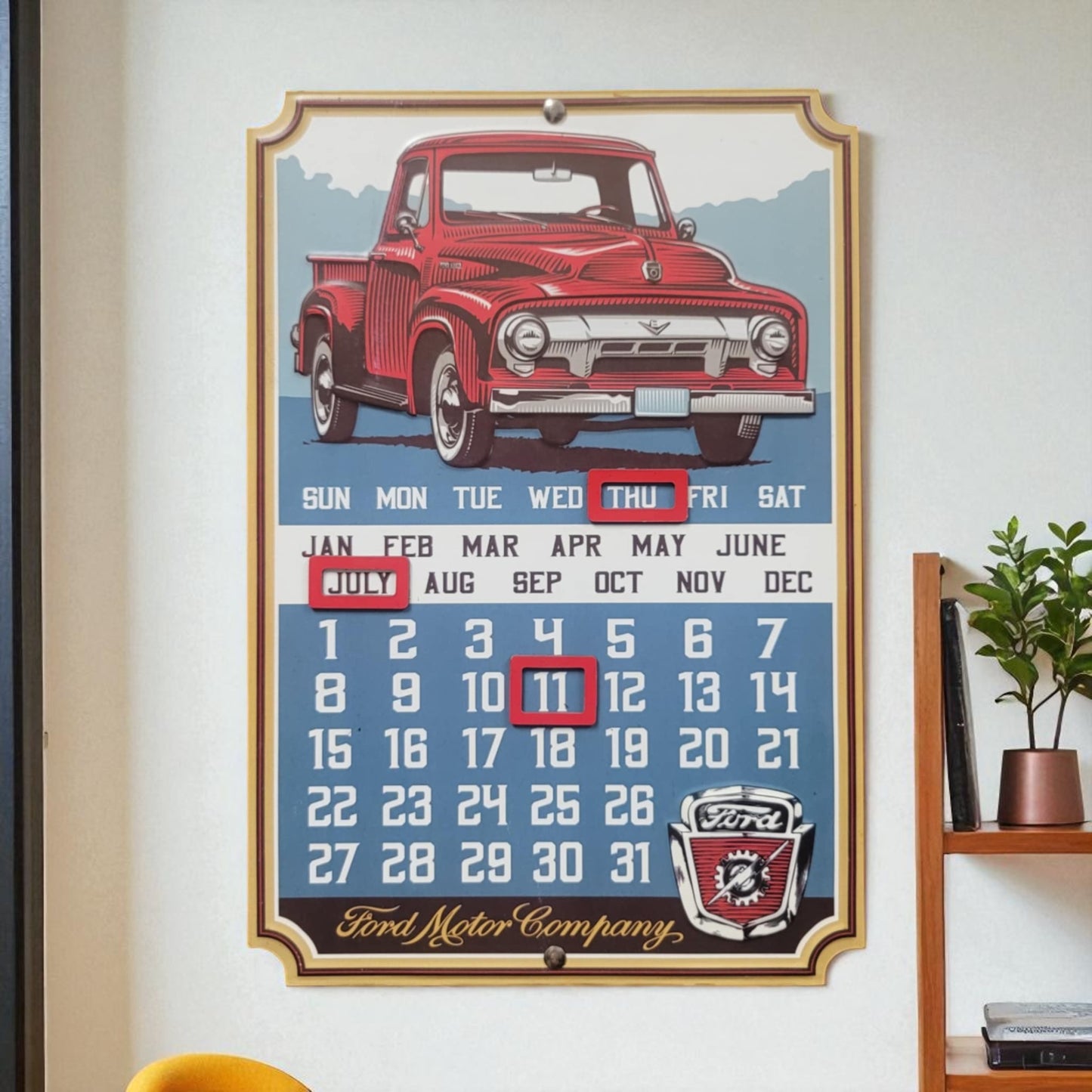 Calendar with a red vintage truck design on a wall