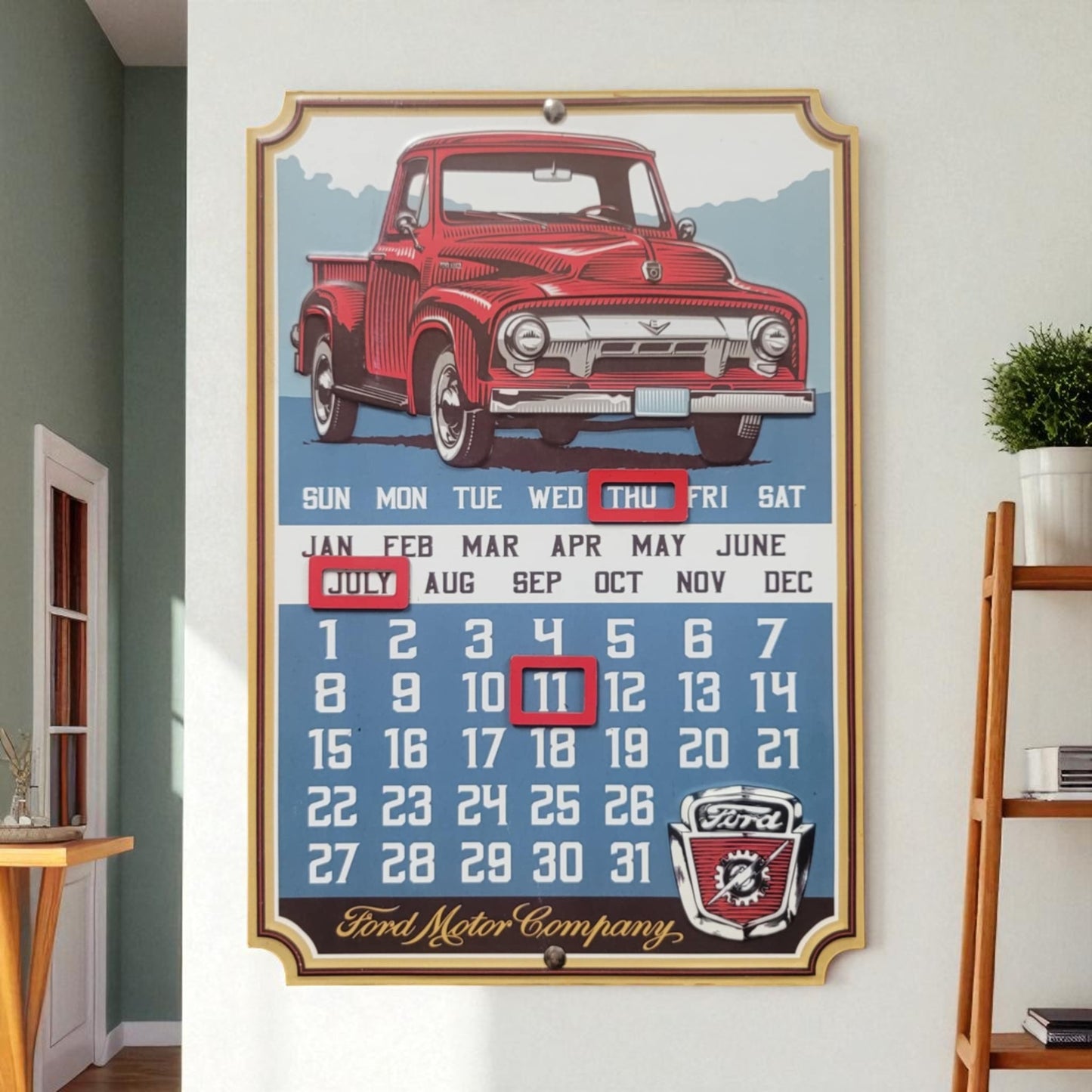 Vintage-style calendar with a red truck design on a wall.