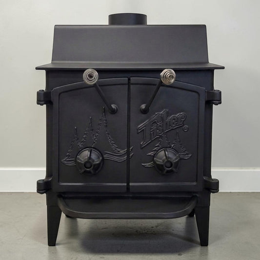 Fisher Grandma Bear wood stove with cathedral doors for dependable wood heating and off-grid living.