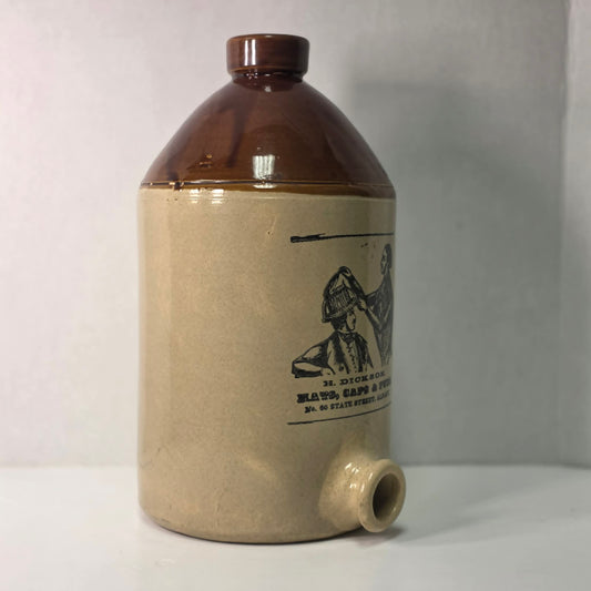 Antique H. Dickson Albany merchant crock with hat shop advertising graphic.
