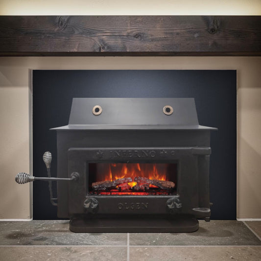 A massive Olsen Inferno Meteor wood stove insert built for serious heat, exceptional durability, and decades of dependable performance.