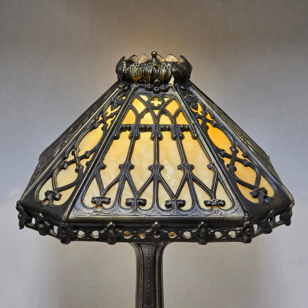 Timeless Victorian elegance in bronze and slag glass.
