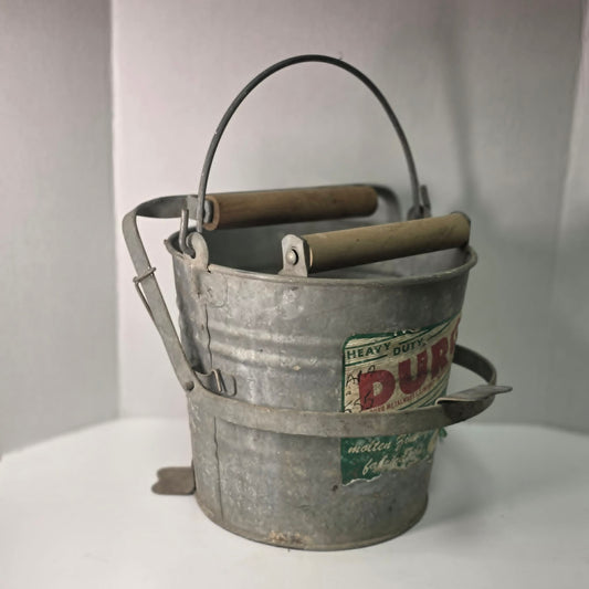 Antique Duro No. 24 galvanized wringer bucket with original label and price marking.