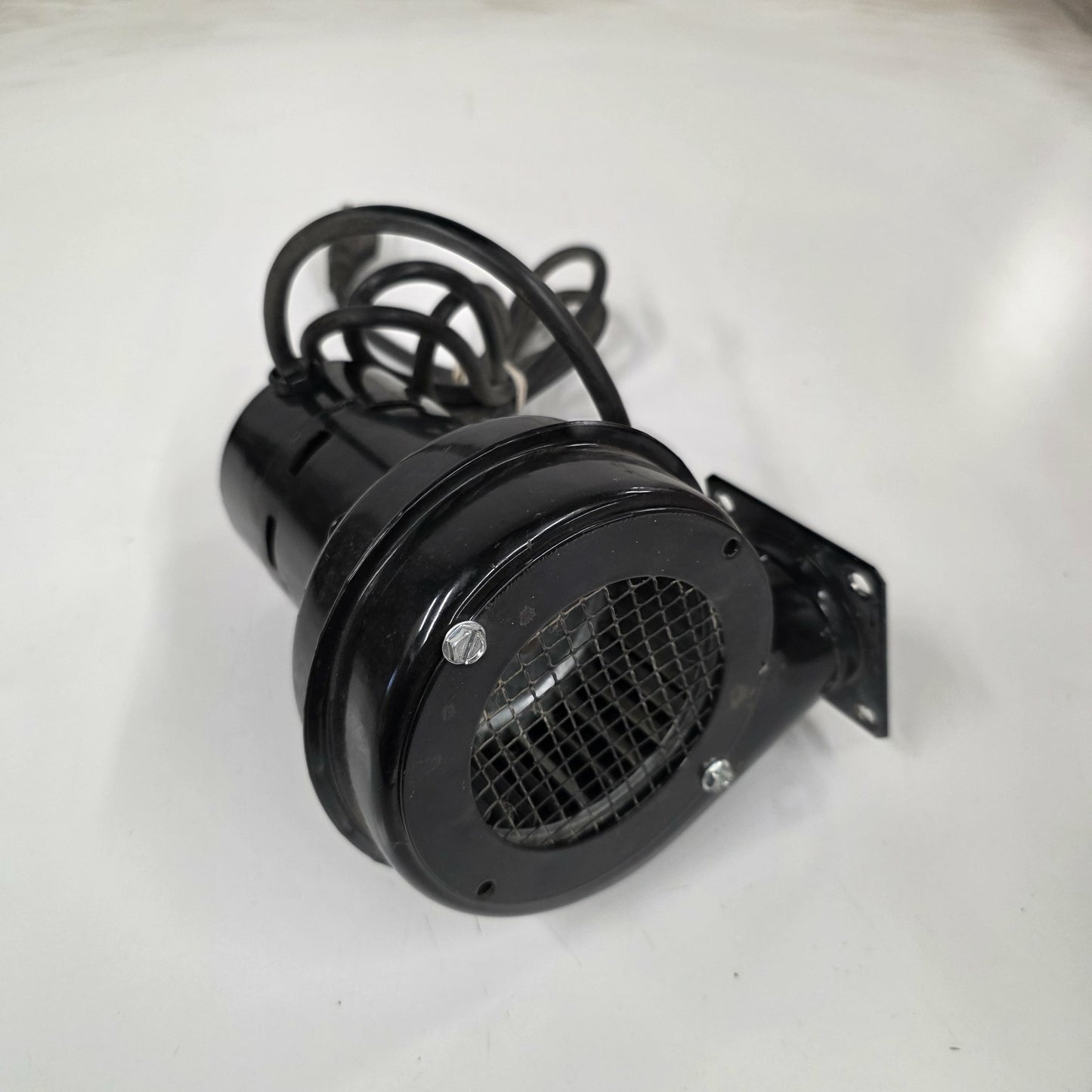 Black metal fan or blower on a white background