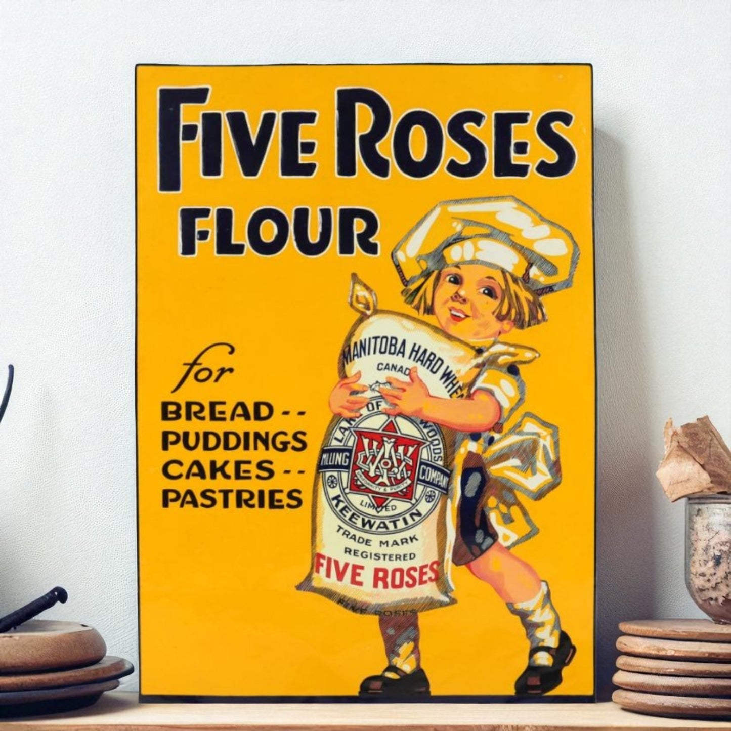 Vintage Five Roses Flour advertisement with a child holding a bag on a yellow background
