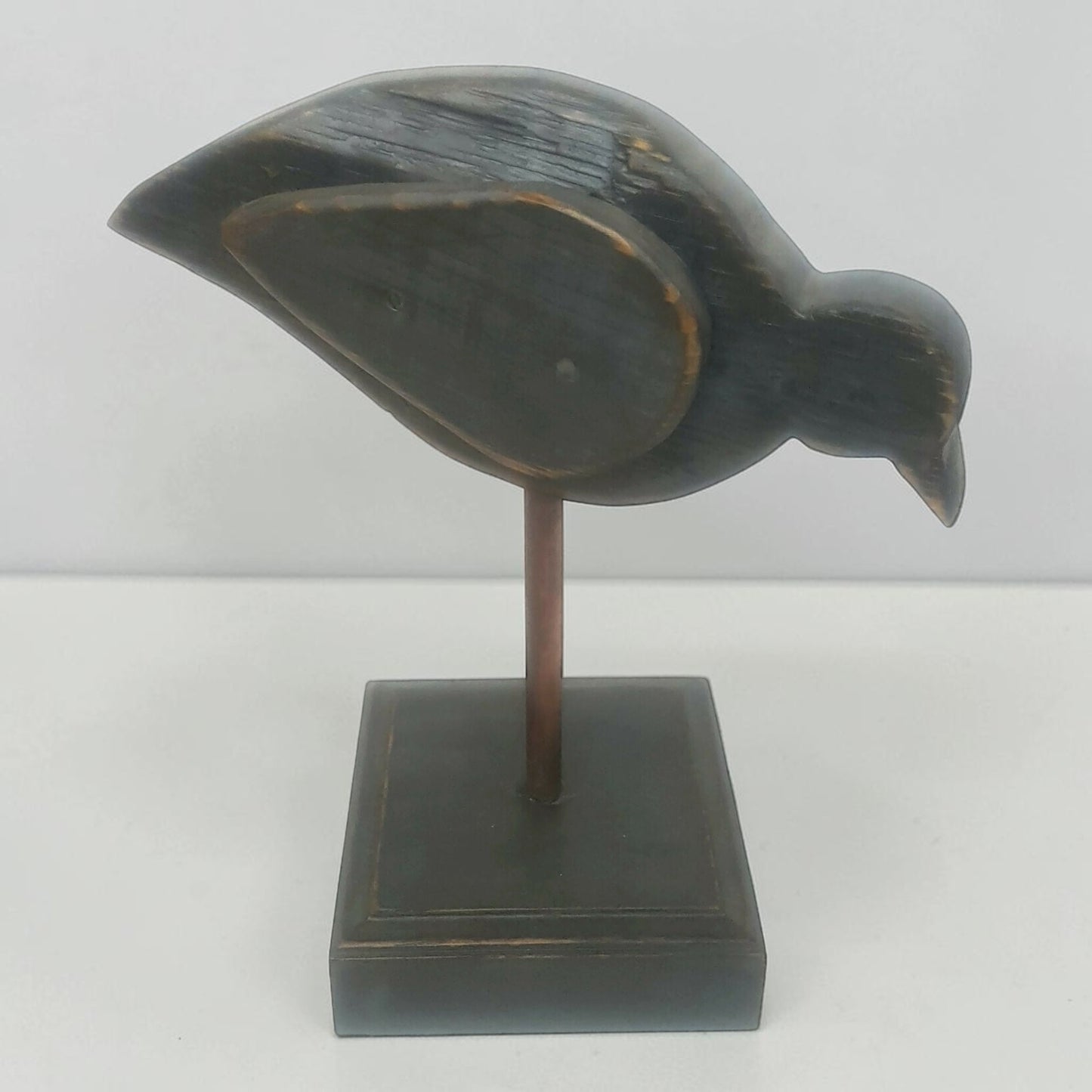 Large folk art bird sculpture with oak base and copper leg for primitive country farmhouse décor.