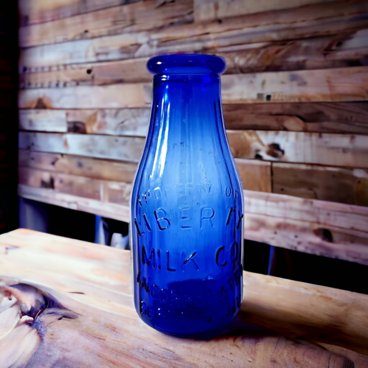 Vintage Cobalt Blue Embossed Liberty Milk Bottle