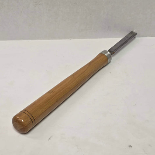 A substantial vintage woodturning gouge built for quality craftsmanship, shaping, and precision lathe work.