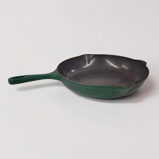 Vintage green Le Creuset No. 23 cast iron frying pan made in France.