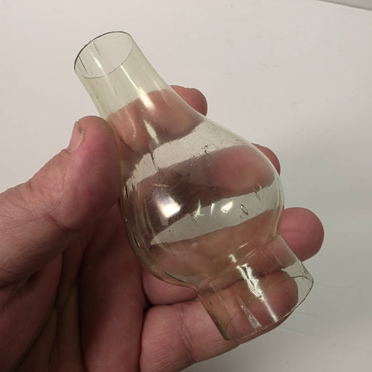 Antique miniature lamp chimney with primitive bubble glass inclusions.