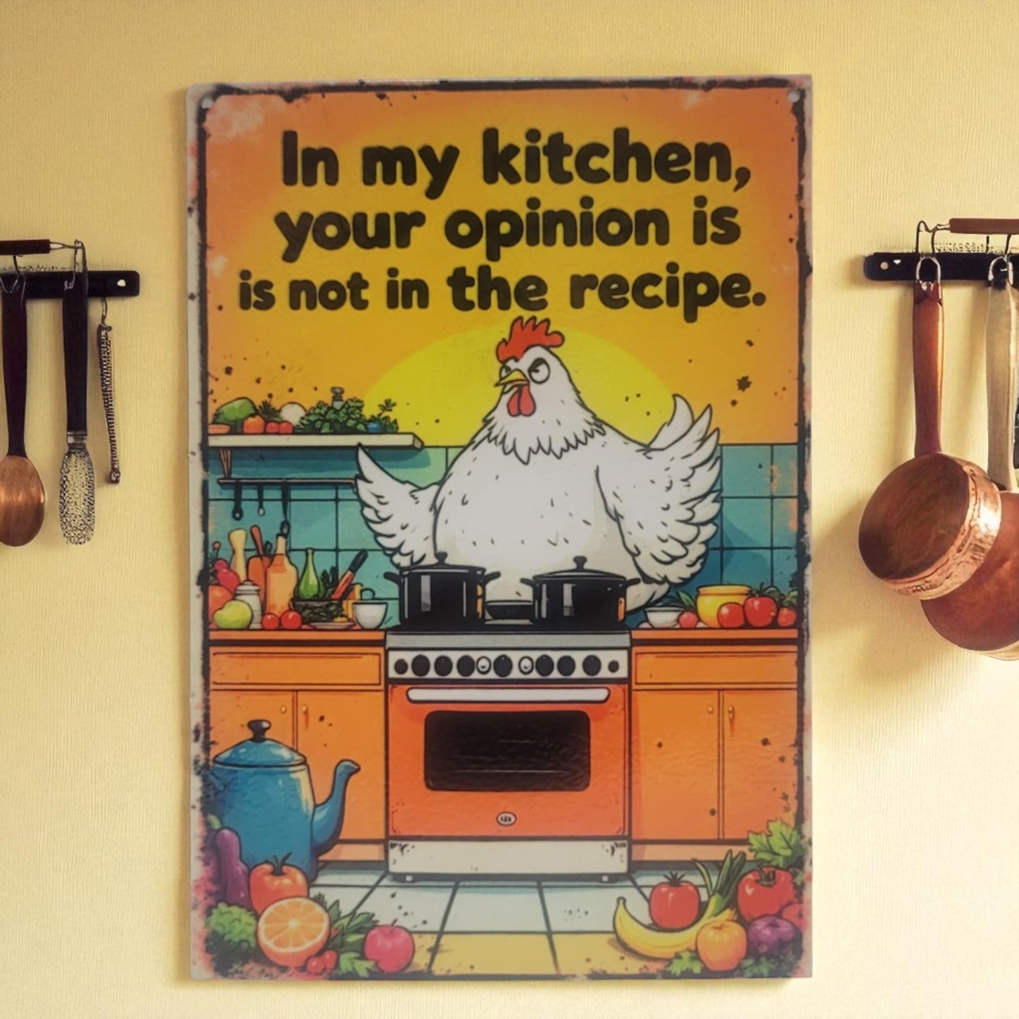 Decorative sign with a chicken in a kitchen setting and text on a yellow wall.