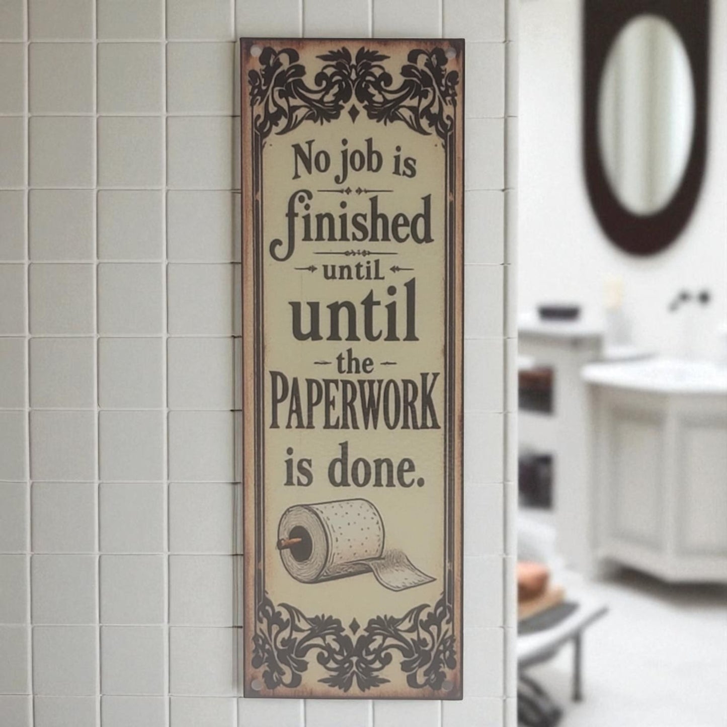 Decorative sign with humorous quote on a tiled bathroom wall.