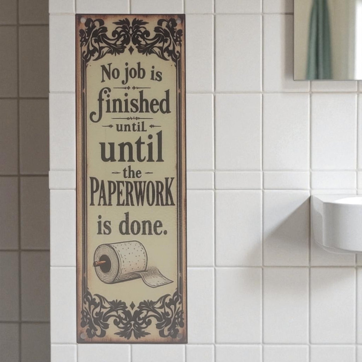 Decorative sign with humorous text on a tiled bathroom wall.