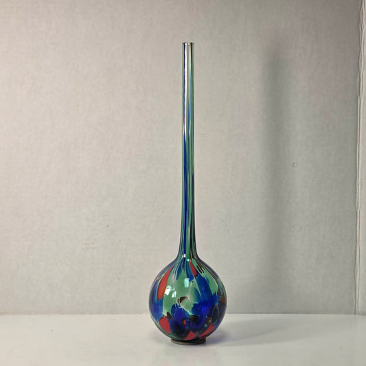 Colorful 14-inch hand-blown glass plant watering ball adding vibrant flair.
