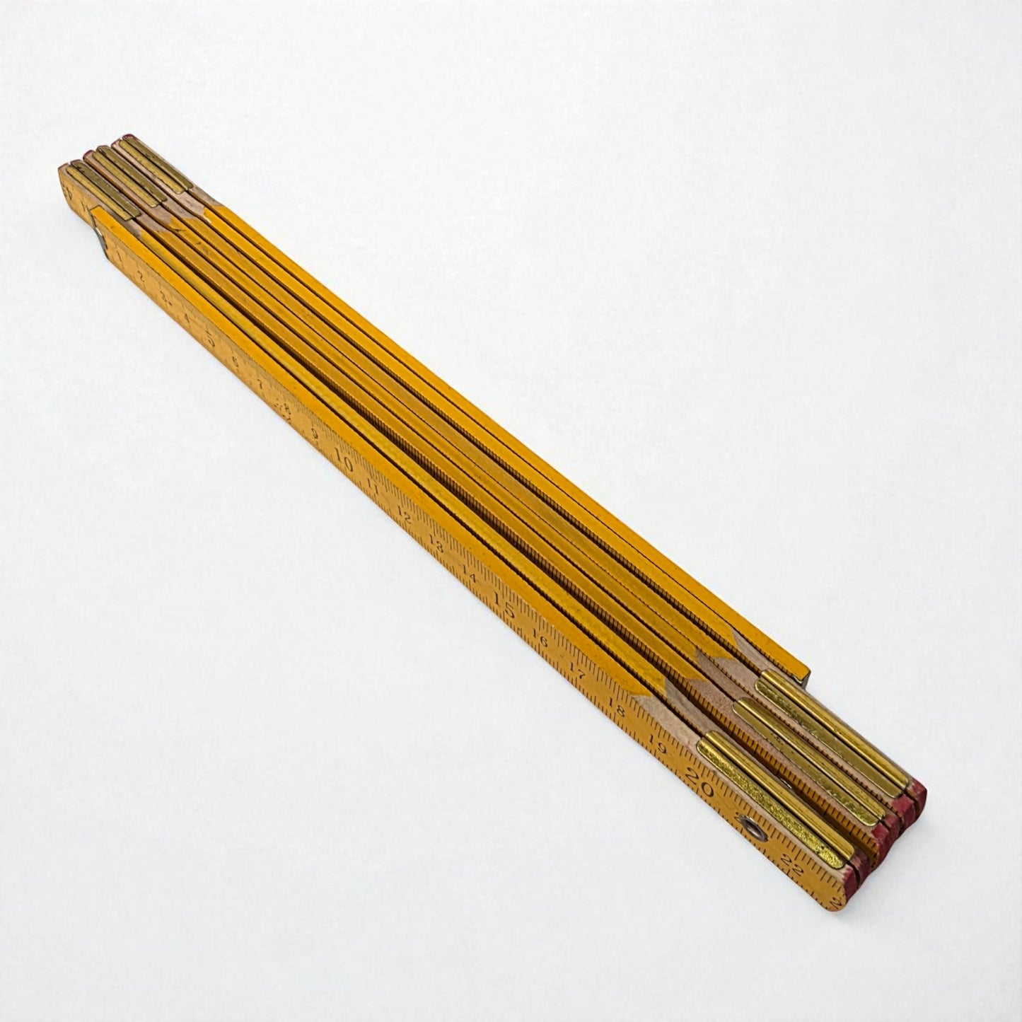 Set of wooden rulers on a white background