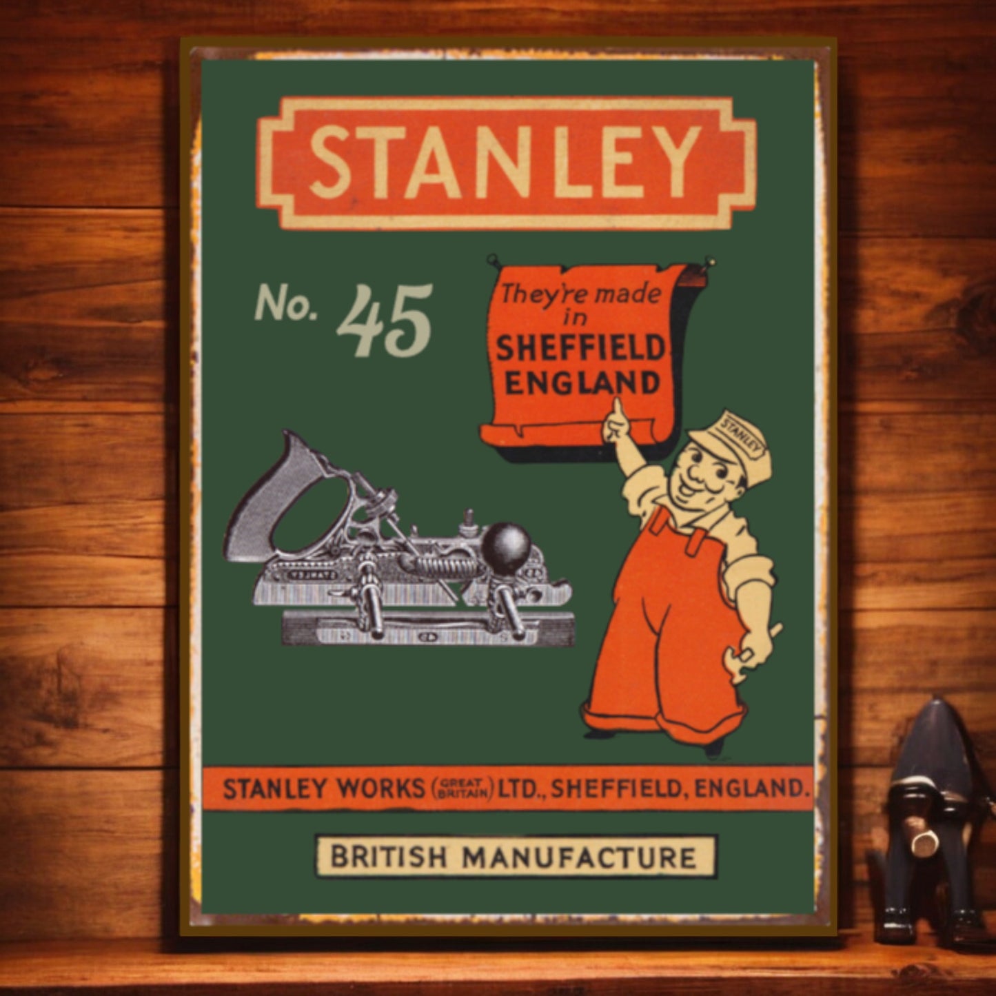 Vintage-style Stanley poster on a wooden surface