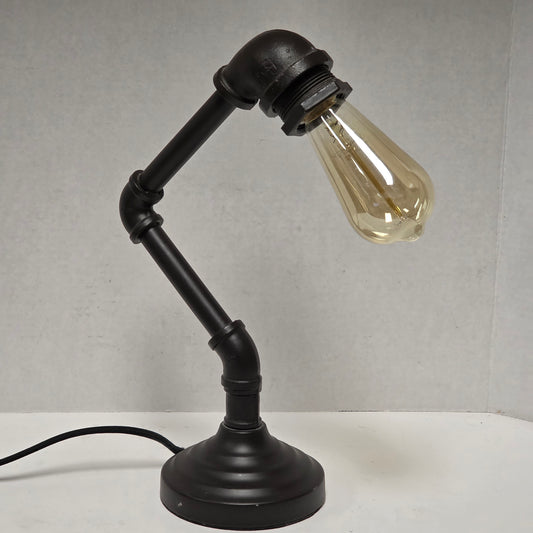 Industrial plumbing pipe lamp with vintage Edison bulb