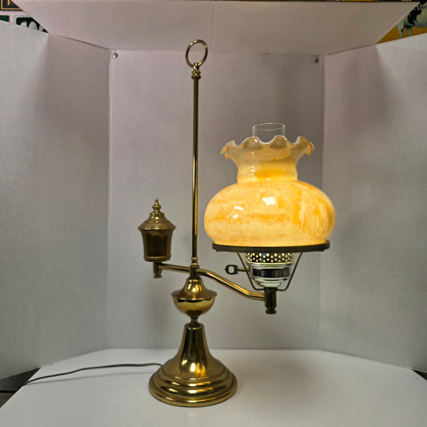 Vintage brass student lamp with hurricane-style shade, 25 inches tall.