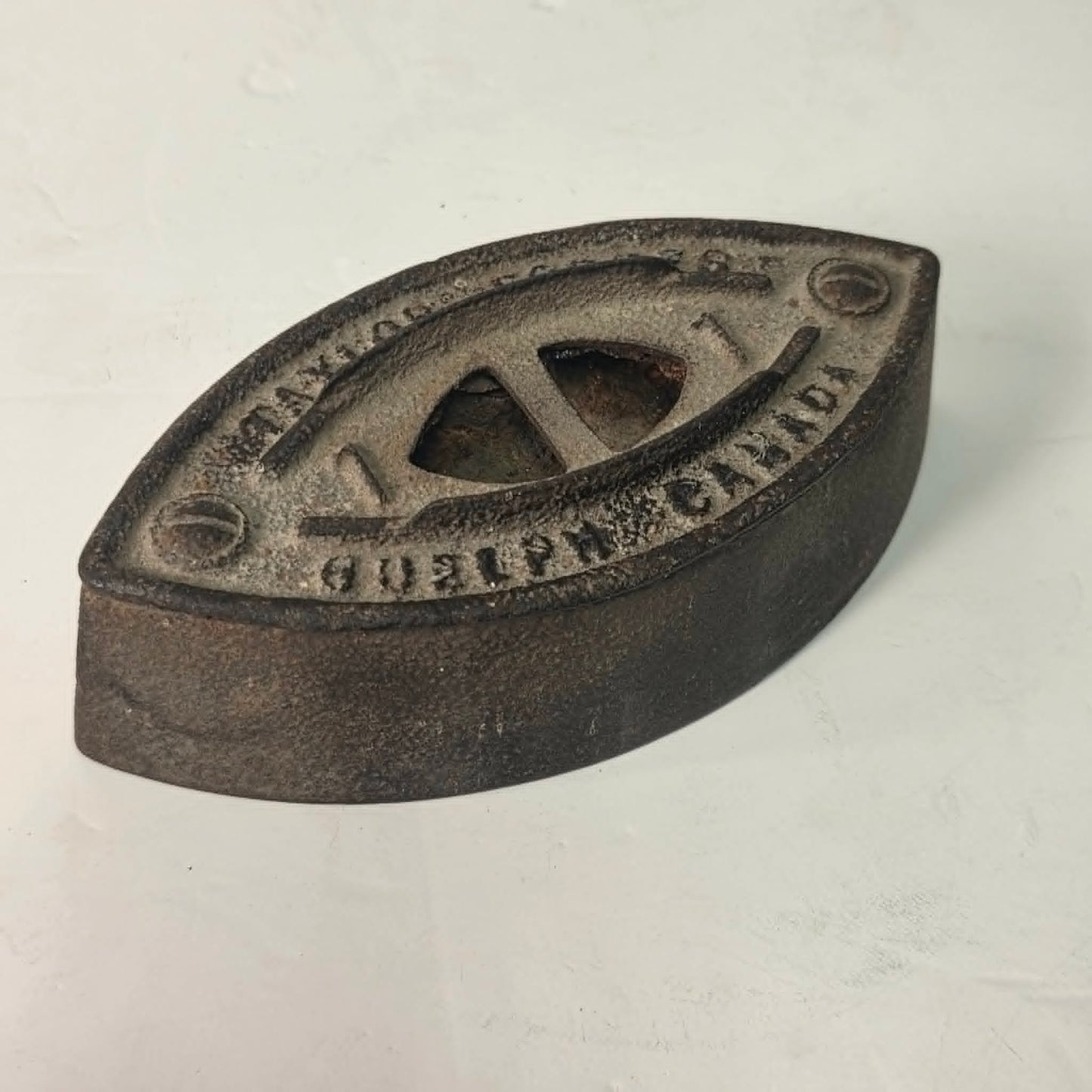 Antique Taylor Forbes No. 1 sad iron made in Guelph, Ontario, Canada.