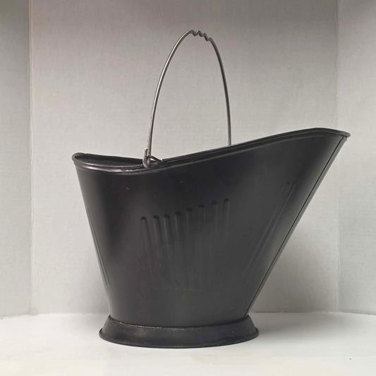 Vintage metal coal scuttle with bail handle for fireplace and wood stove use.