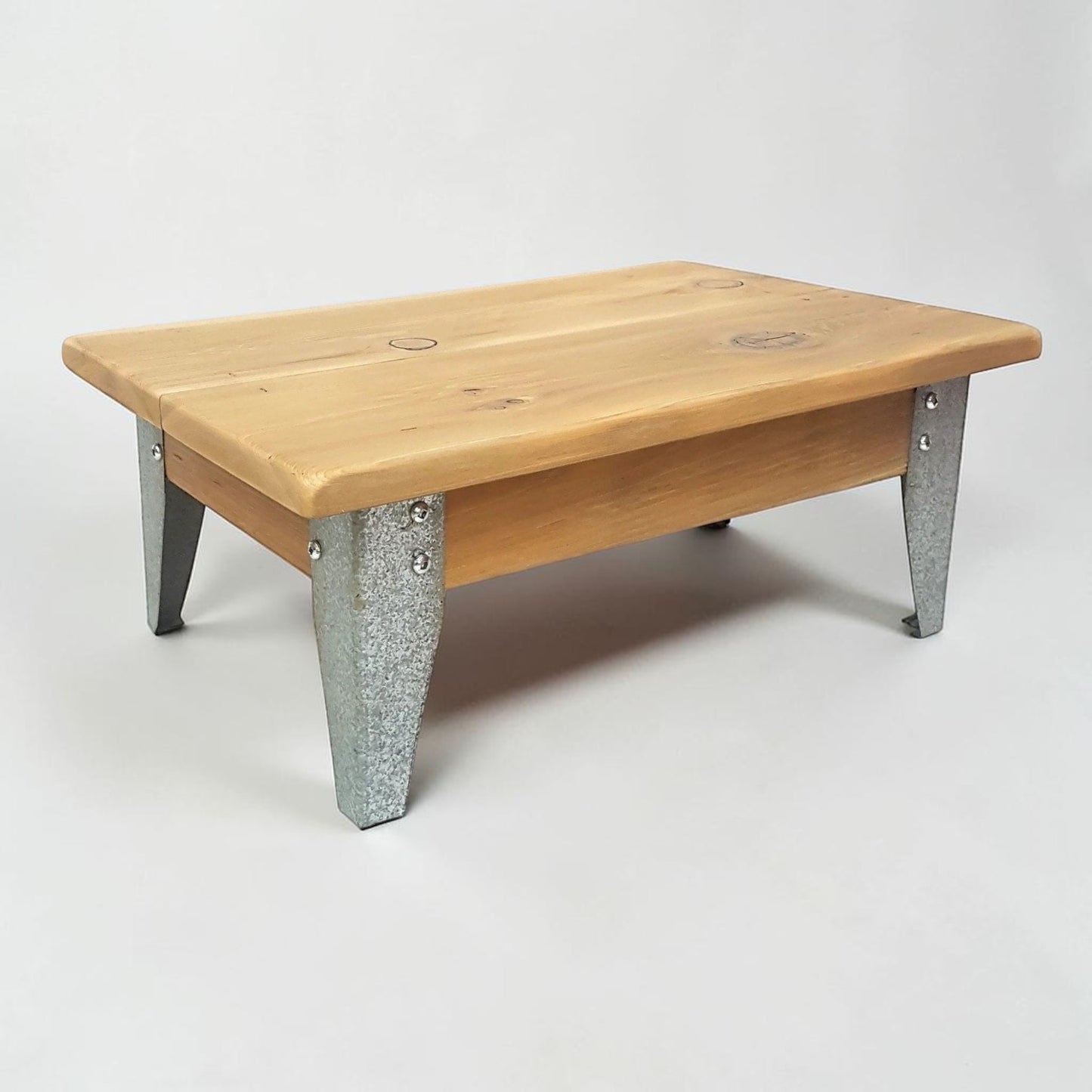 Handmade reclaimed cedar and barn metal serving riser with rustic charm.