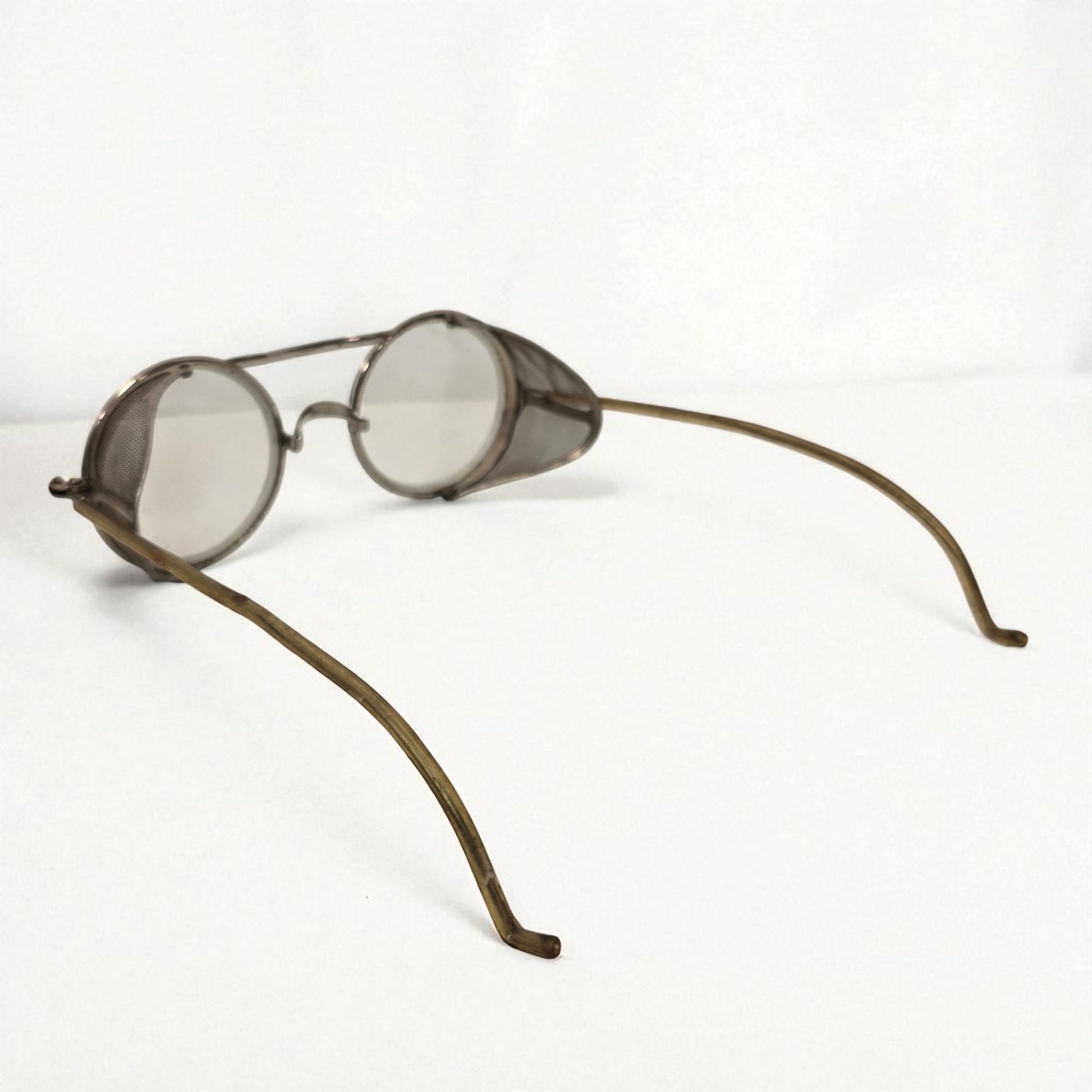 Vintage-style eyeglasses with round lenses on a white background