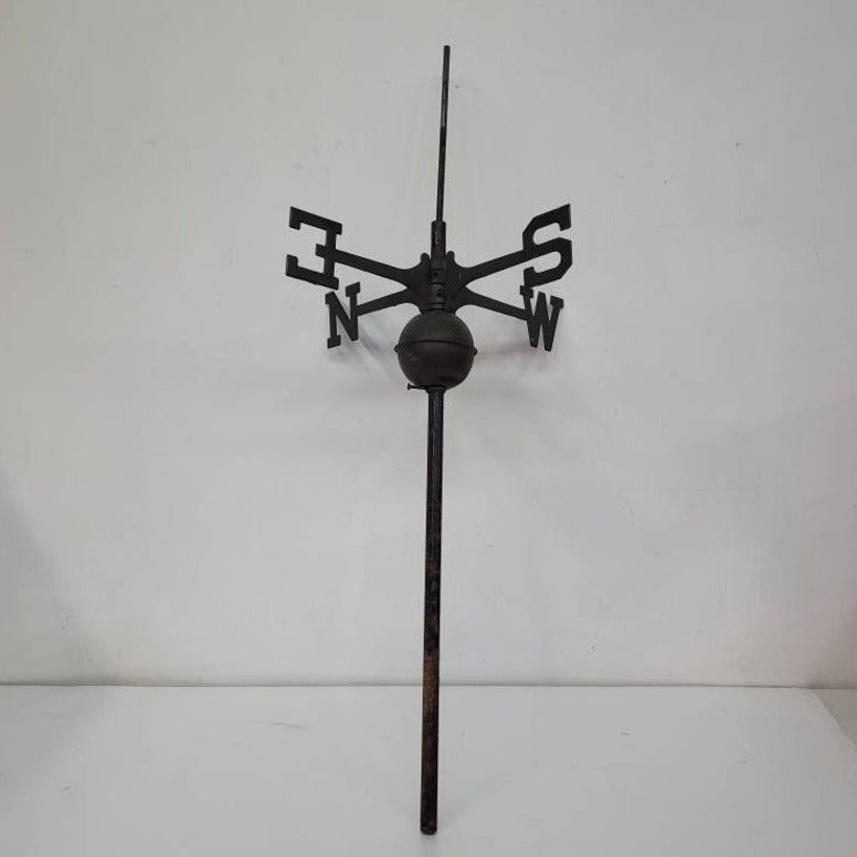Antique hollow-bodied copper rooster weathervane with directional base, architectural salvage for farmhouse or barn decor.