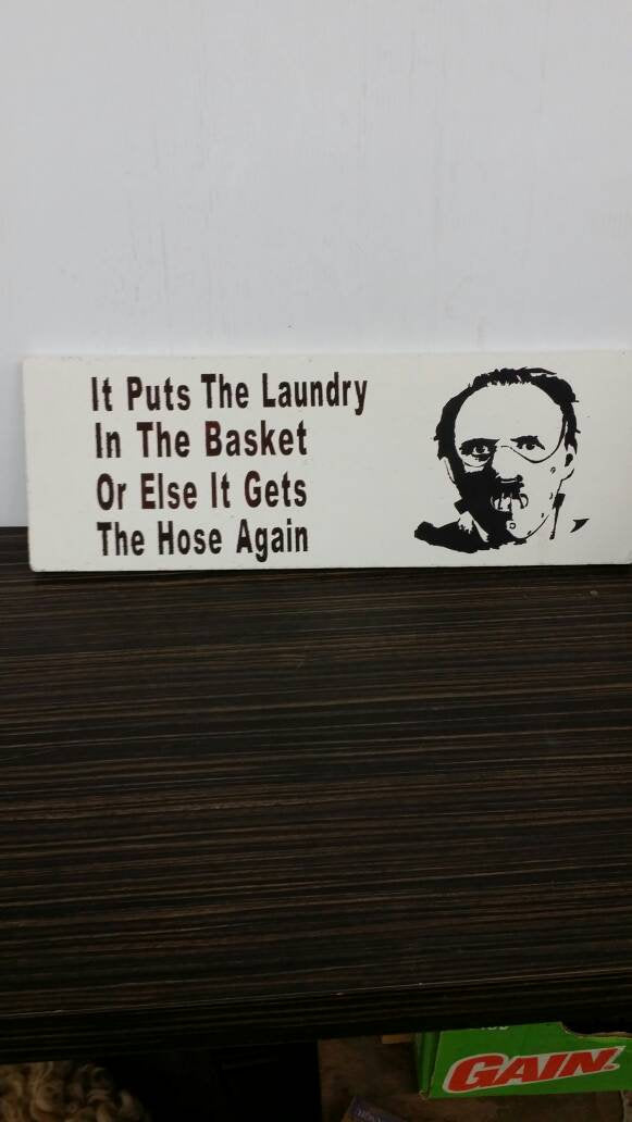 wooden handmade laundry sign