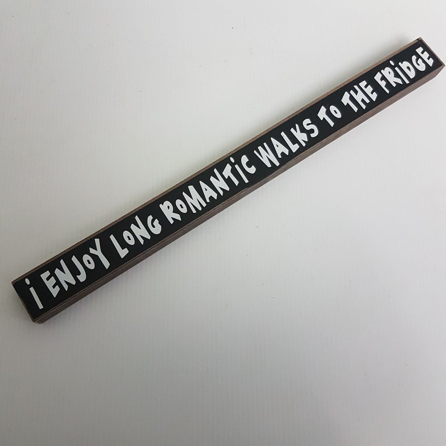 inspirational desktop sign " i enjoy long romantic walks to the fridge "