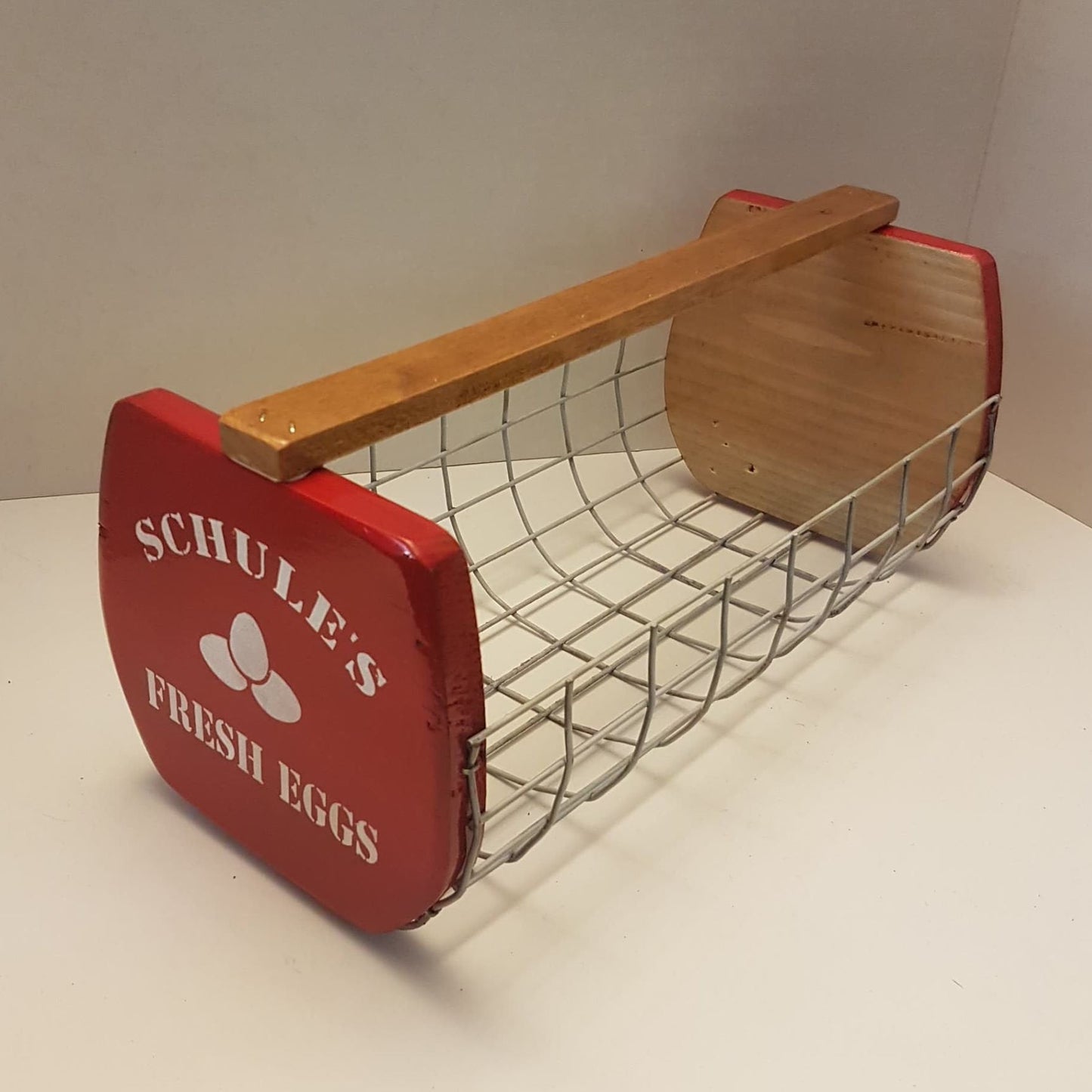 rustic wooden wire egg basket fresh eggs