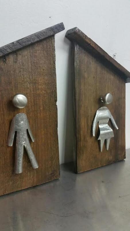 mens and womans bathroom restrooms sign