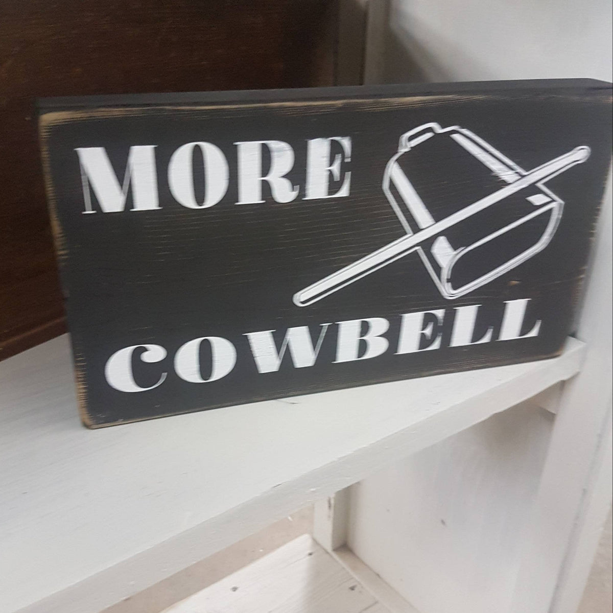 needs more cowbell sign