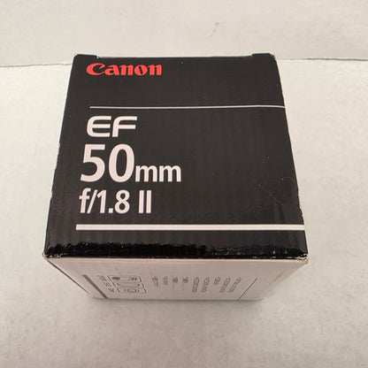 Canon camera lens box with 'EF 50mm f/1.8 II' text on a light gray background