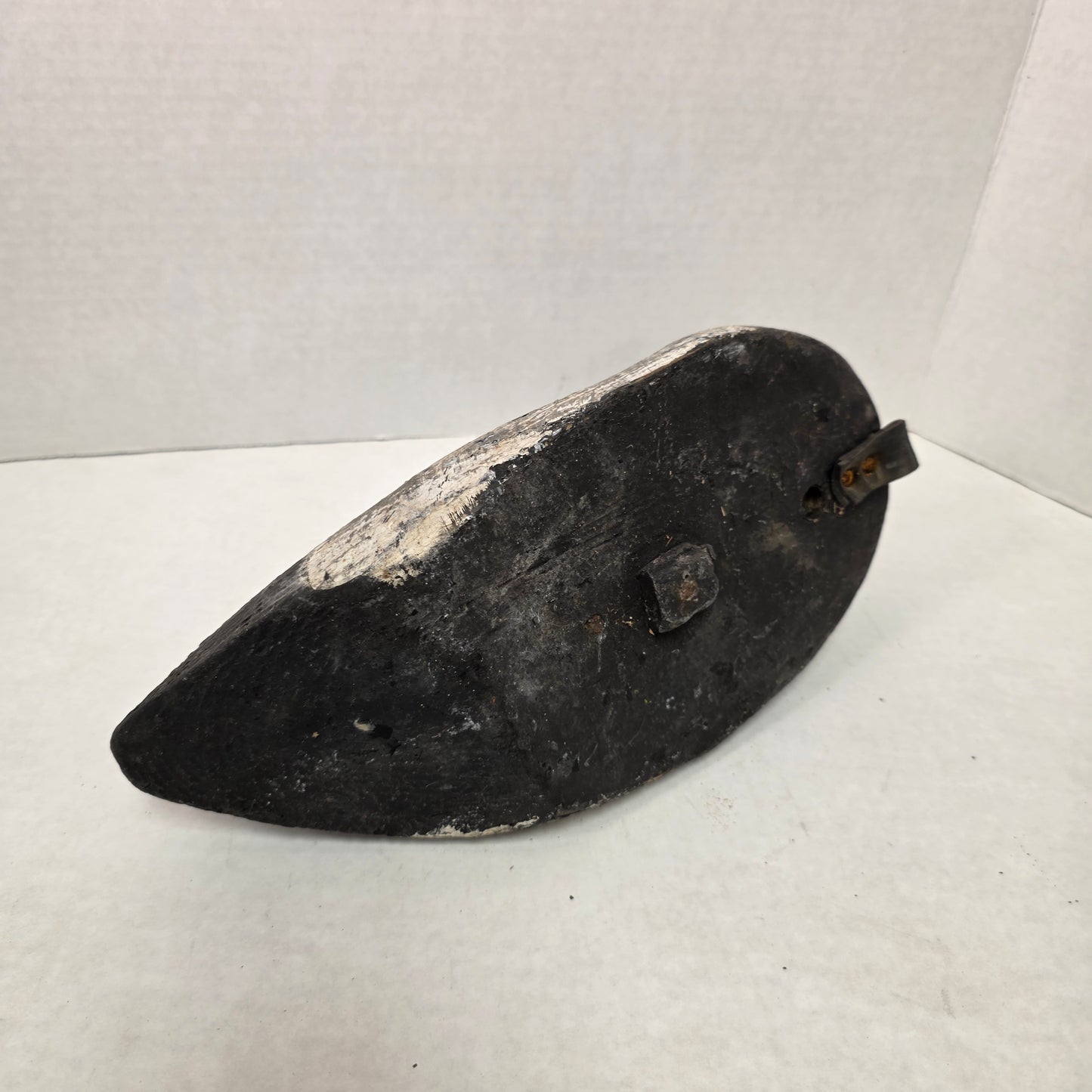 Wooden duck decoy on a white background
