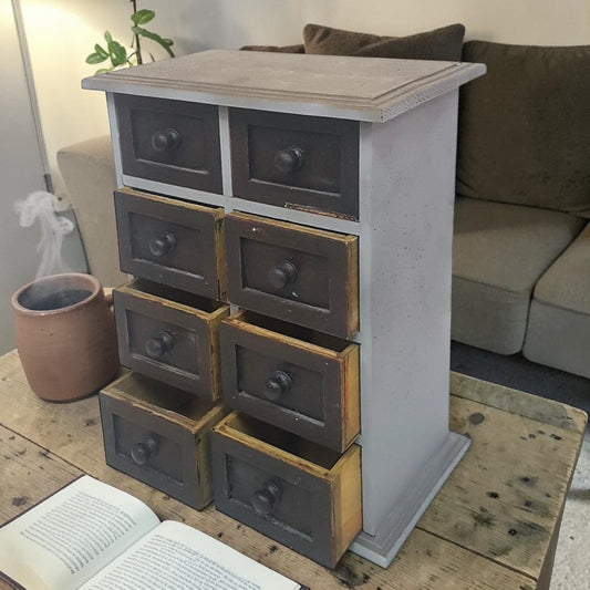 Vintage 8-drawer apothecary cabinet – compact and versatile home organizer.