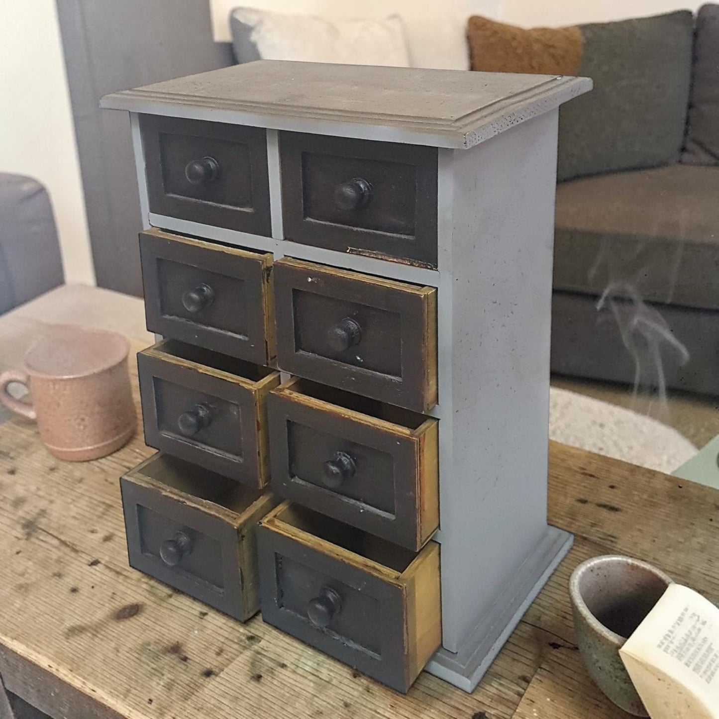 Vintage 8-drawer apothecary cabinet – compact and versatile home organizer.