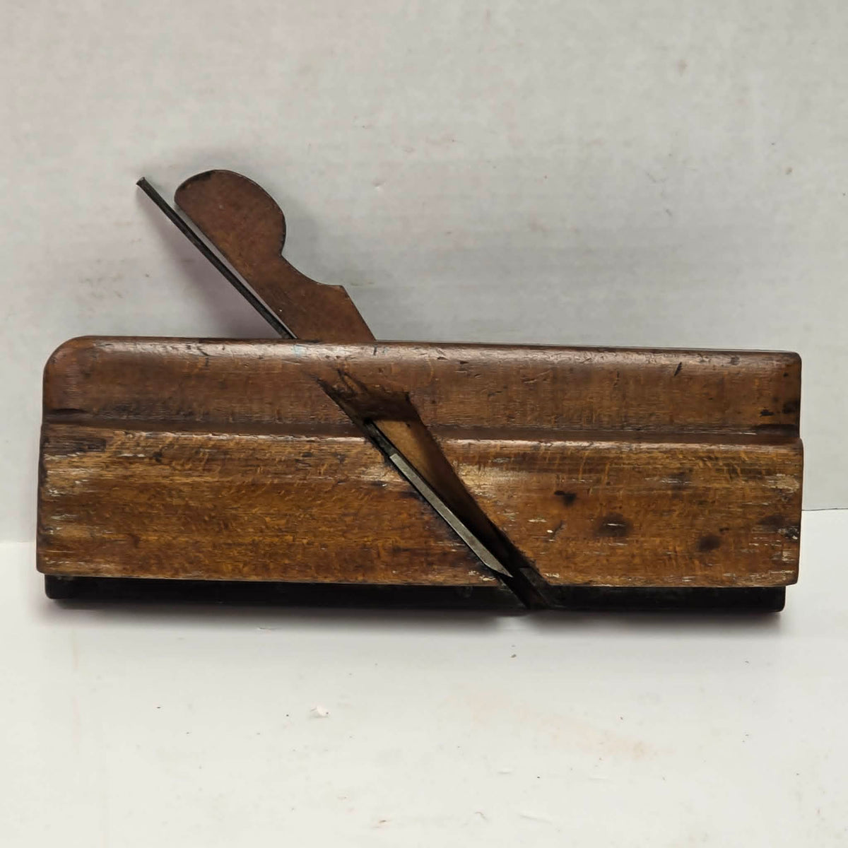 Antique A. Howland & Co. tongue molding plane with metal shoe.
