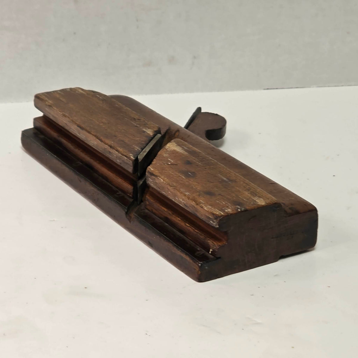Antique A. Howland & Co. tongue molding plane with metal shoe.
