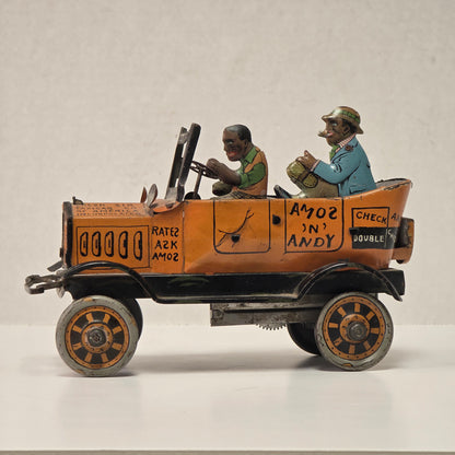 Antique Louis Marx Amos ’n’ Andy Fresh Air Taxi Cab tin lithographed wind-up jalopy toy
