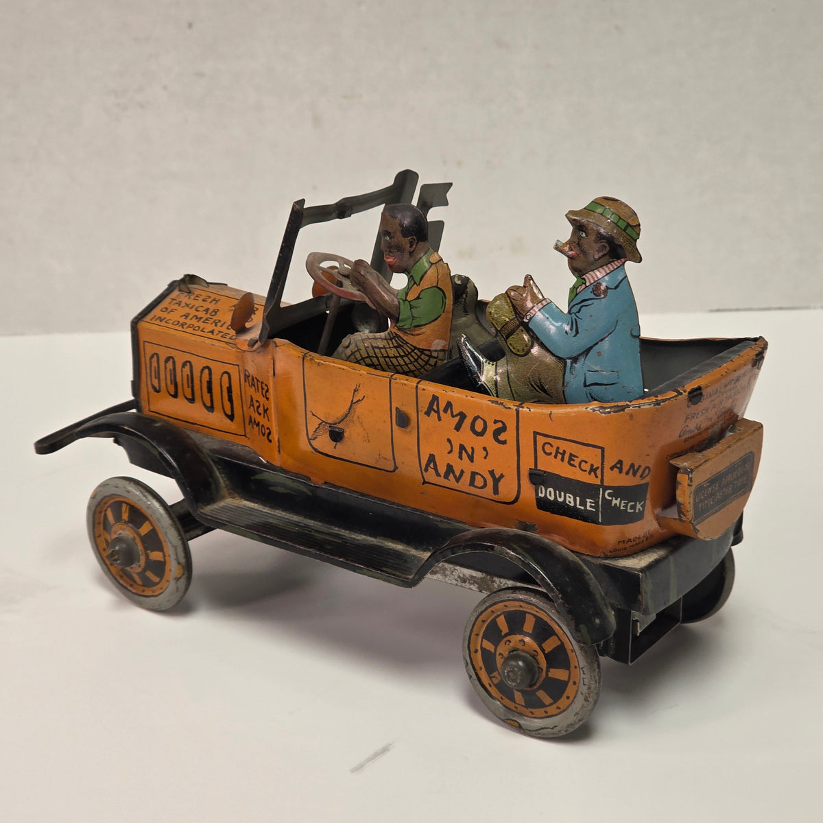 Antique Louis Marx Amos ’n’ Andy Fresh Air Taxi Cab tin lithographed wind-up jalopy toy

