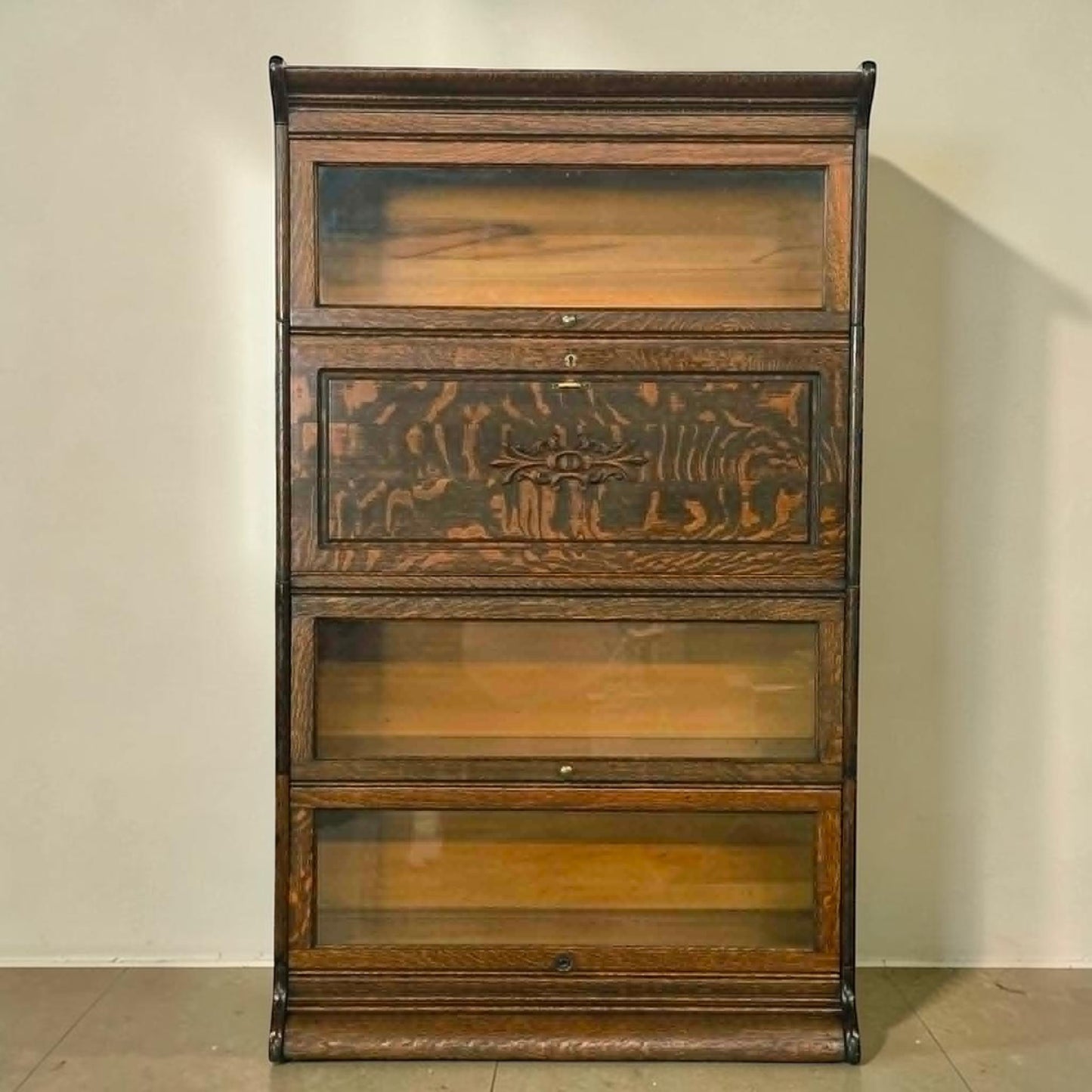 Antique quarter sawn oak barrister bookcase with fold-down writing desk.
