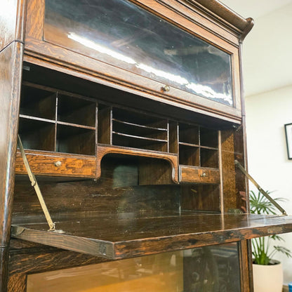 Antique quarter sawn oak barrister bookcase with fold-down writing desk.
