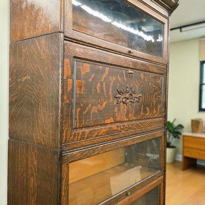Antique quarter sawn oak barrister bookcase with fold-down writing desk.
