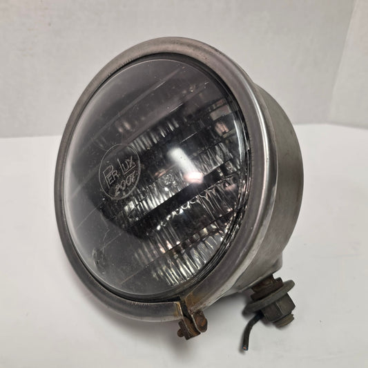 Vintage Perlux 200T stainless steel industrial spotlight with railway character.
