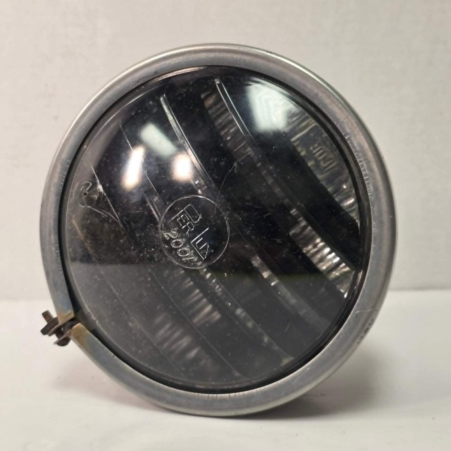 Vintage Perlux 200T stainless steel industrial spotlight with railway character.