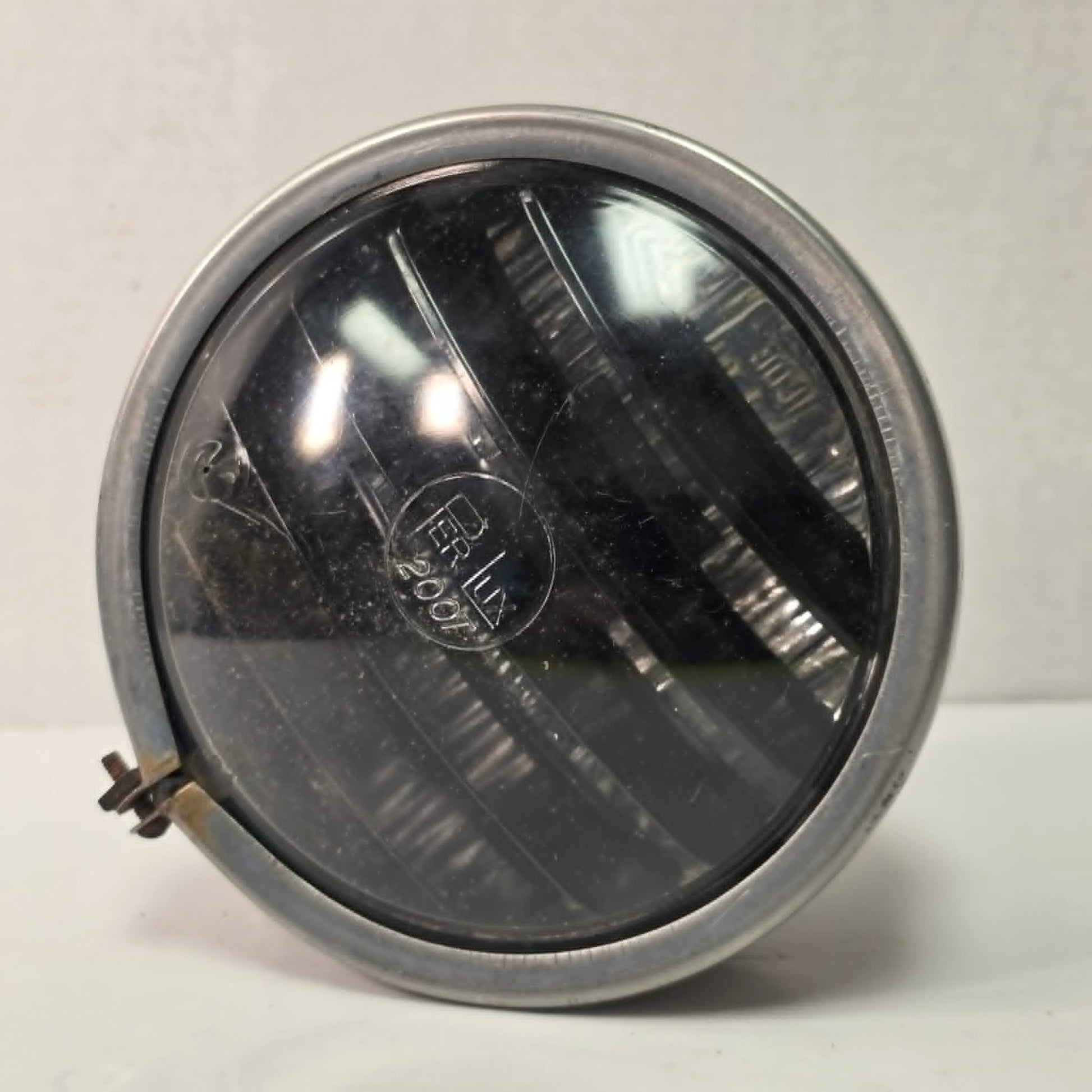 Vintage Perlux 200T stainless steel industrial spotlight with railway character.