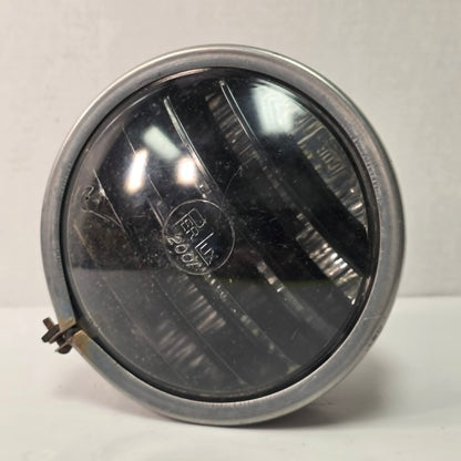 Vintage Perlux 200T stainless steel industrial spotlight with railway character.
